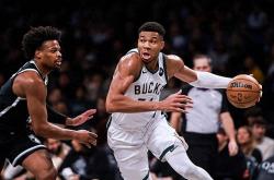 雷速体育app-雄鹿大胜森林狼，继续领跑东部